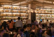 group of people gathering inside bar