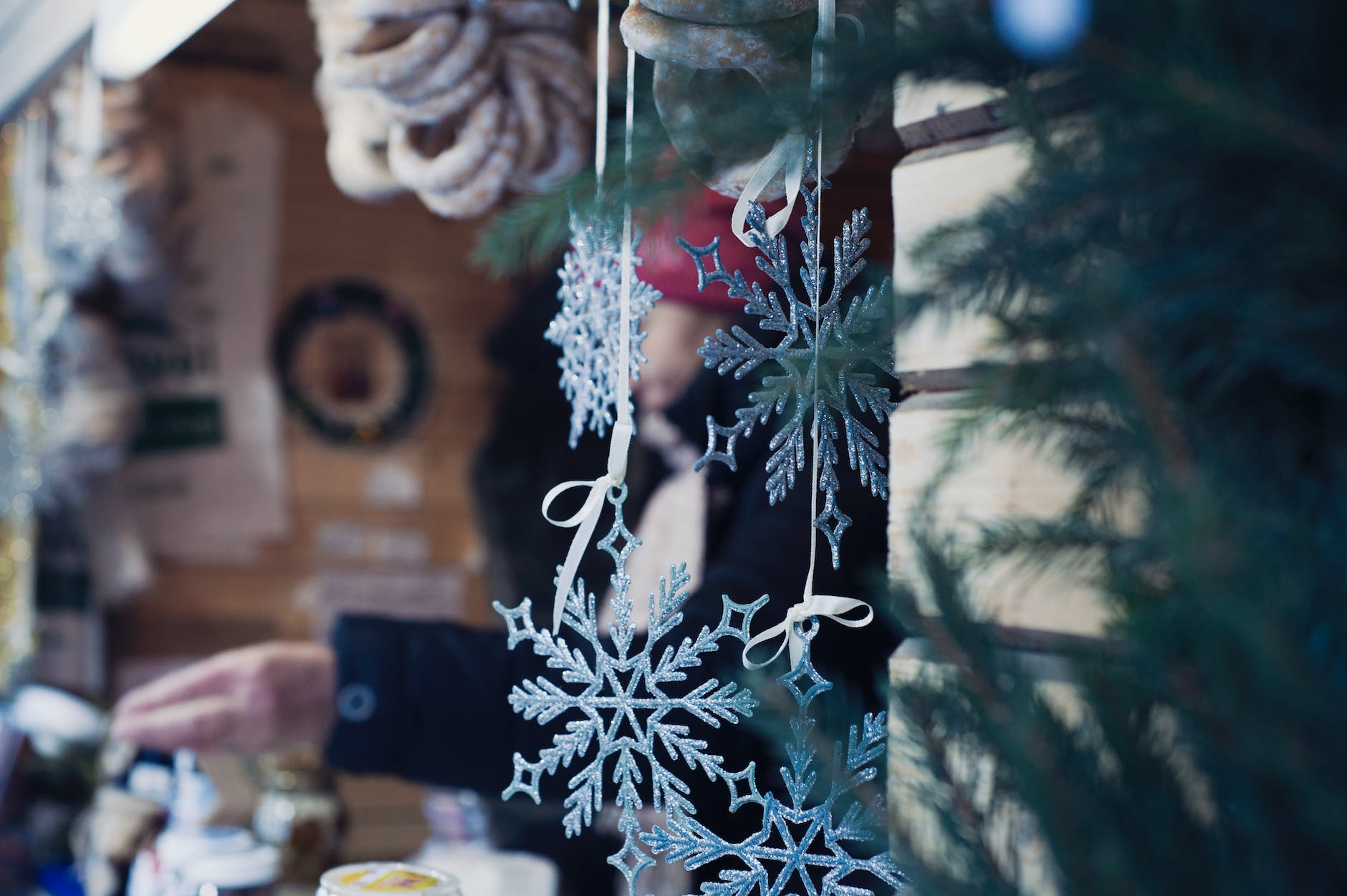 shallow focus photography of snowflakes christmas tree decor