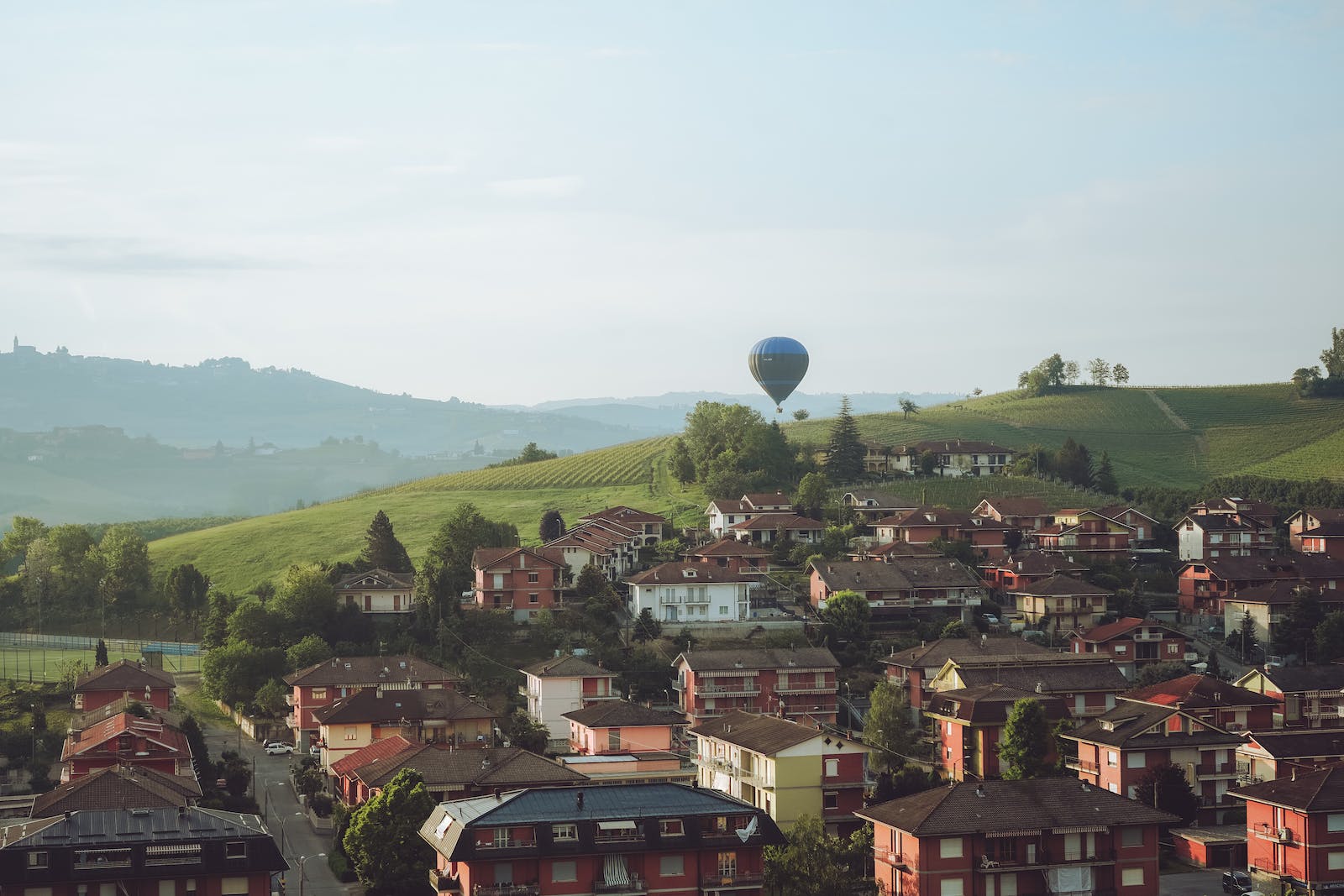 Hot air balloons above Barolo