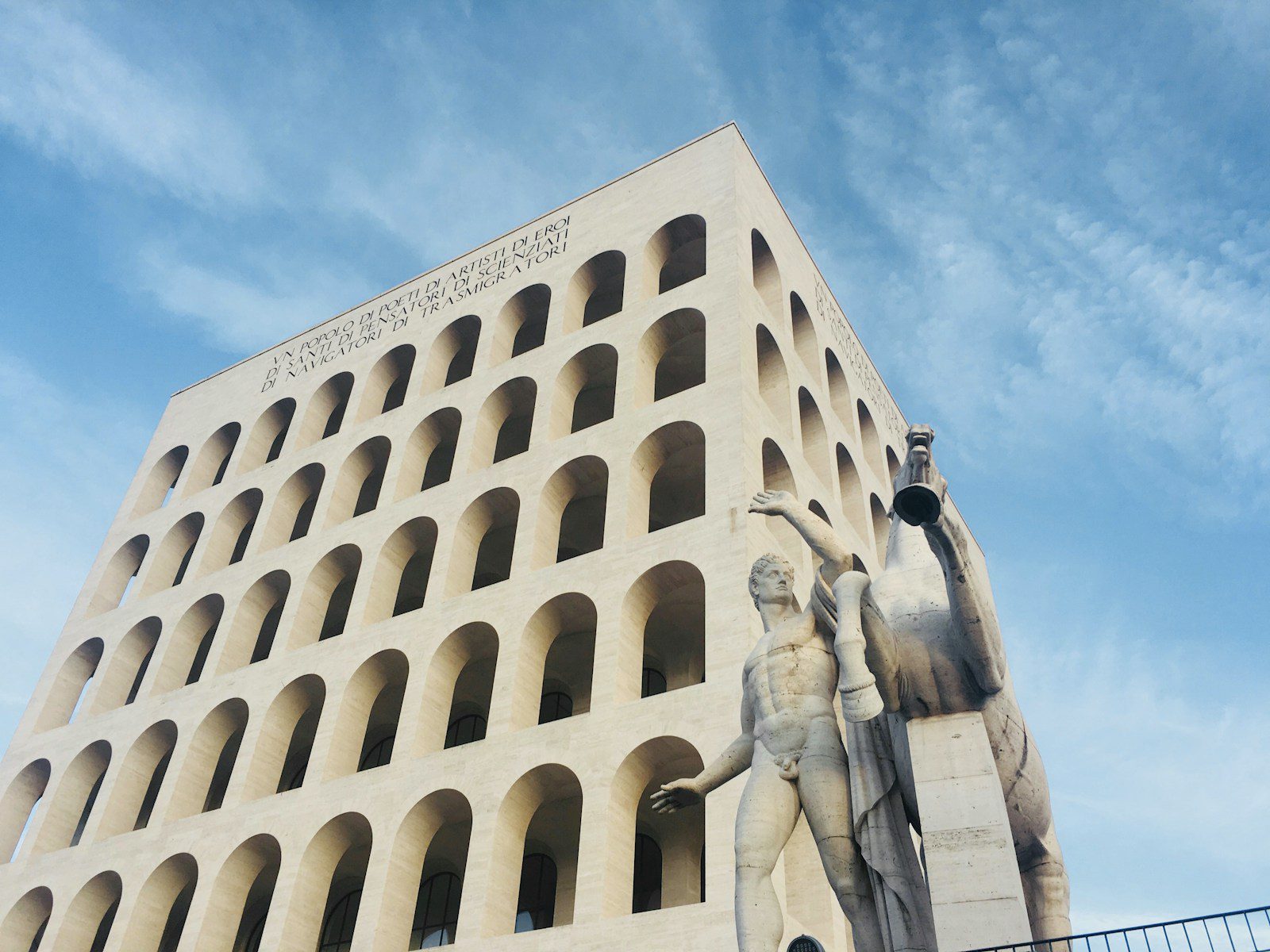 white concrete building under blue sky during daytime